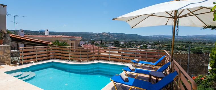 Private pool and sun loungers overlooking the valley and mountains